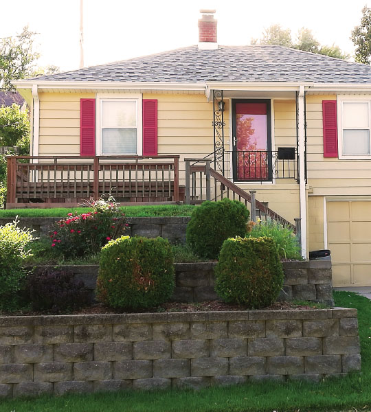 Photo of house with green stepped garden